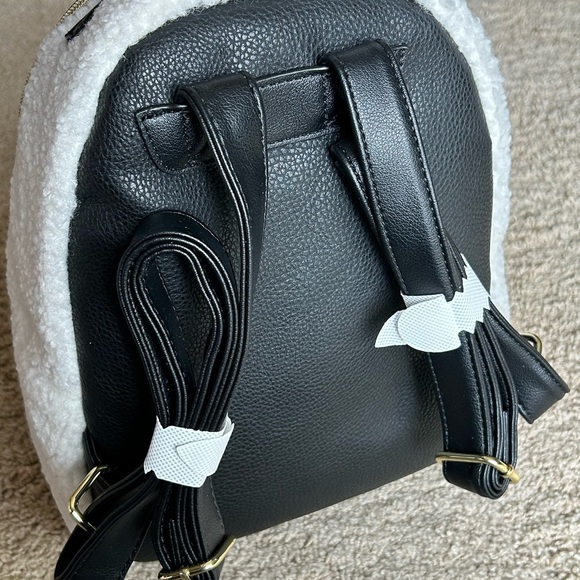 Juicy Couture Flashback Black and White Faux Leather Sherpa Backpack - Picture 2 of 3